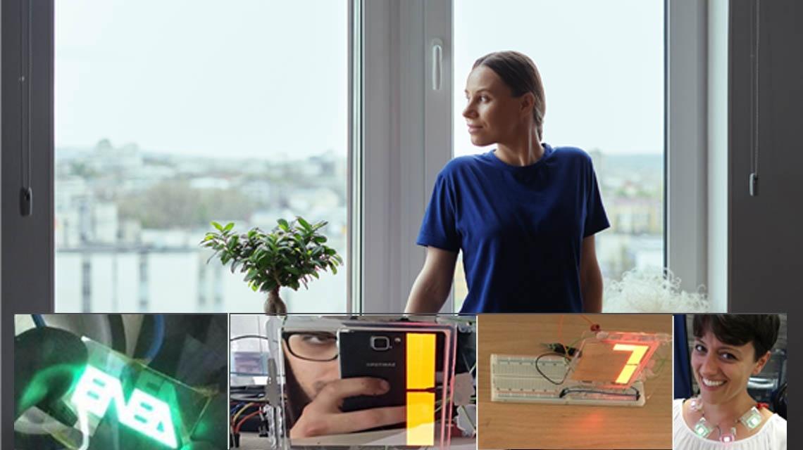 Donna di fronte alla finestra e tecnologia oled